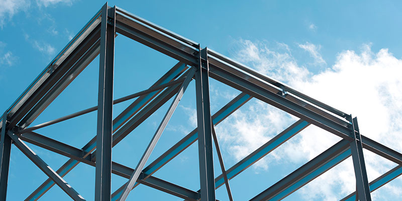 Scaffolding with a clear blue sky in the background.